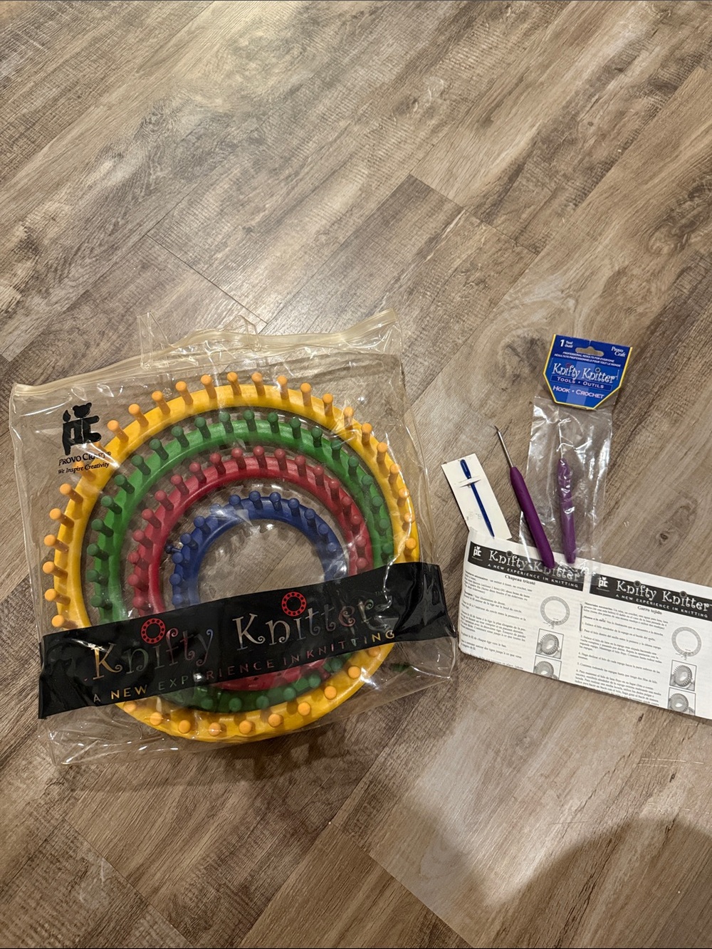 Knifty Knitter Round Loom Set in Yellow, Green, Red, Blue with extra hook